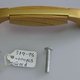 Handle with Centrally Located Piece